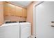 Laundry room with washer, dryer, and cabinets at 14757 W Pinchot Ct, Goodyear, AZ 85395