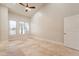 Bright bedroom with large windows and neutral walls at 16218 S 24Th Pl, Phoenix, AZ 85048