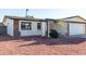 House exterior featuring a contemporary design and well-maintained landscaping at 17621 N 18Th Dr, Phoenix, AZ 85023