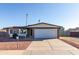 Single story home with a two-car garage and well-maintained landscaping at 17621 N 18Th Dr, Phoenix, AZ 85023