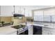 Modern kitchen with white cabinets, stainless steel appliances at 17621 N 18Th Dr, Phoenix, AZ 85023