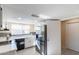 Clean and efficient kitchen with stainless steel refrigerator at 17621 N 18Th Dr, Phoenix, AZ 85023