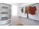 Bright walk-in closet with ample shelving and hanging space at 2181 N Iowa St, Chandler, AZ 85225