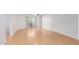 Living area with wood floors and view of patio doors at 2228 N 52Nd St # 240, Phoenix, AZ 85008