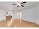 Bright living room with wood floors and open kitchen at 2228 N 52Nd St # 240, Phoenix, AZ 85008