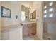 Bathroom with vanity, stone countertop and walk-in shower at 24200 N Alma School Rd # 2, Scottsdale, AZ 85255