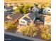 Aerial view of a two-story house and neighborhood at 2556 W Ironstone Ave, Apache Junction, AZ 85120