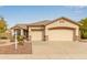 House exterior with a two-car garage and desert landscaping at 3156 W Steinbeck Dr, Anthem, AZ 85086