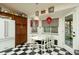 Kitchen with checkerboard floor and a small dining area at 4819 W Chicago St, Chandler, AZ 85226