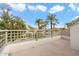 Private balcony overlooking trees and courtyard at 7272 E Gainey Ranch Rd # 91, Scottsdale, AZ 85258