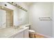 Small bathroom with toilet and sink at 7272 E Gainey Ranch Rd # 91, Scottsdale, AZ 85258