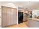 Kitchen features granite counters, stainless steel appliances, and ample cabinetry at 7272 E Gainey Ranch Rd # 91, Scottsdale, AZ 85258