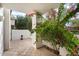 Patio with bougainvillea and potted urn at 7272 E Gainey Ranch Rd # 91, Scottsdale, AZ 85258