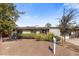Single-story house with a well-maintained front yard and landscaping at 1008 W Amelia Ave, Phoenix, AZ 85013