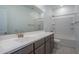 Clean bathroom with modern vanity and shower/tub combo at 1057 S 151St Ln, Goodyear, AZ 85338