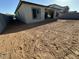 View of home's back exterior and large backyard at 11510 E Utopia Ave, Mesa, AZ 85212