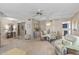 Spacious dining area featuring a glass table and four chairs at 13023 W Skyview Dr, Sun City West, AZ 85375