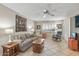 Cozy living room with a sofa, rocking chair, and coffee table at 13023 W Skyview Dr, Sun City West, AZ 85375