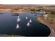 Aerial view of lake with fountains and landscaping at 17957 W Fairview St, Goodyear, AZ 85338