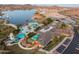 Aerial view of pool, clubhouse, and lake at 17957 W Fairview St, Goodyear, AZ 85338