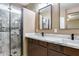 Bathroom boasts double vanity and a walk-in shower at 17957 W Fairview St, Goodyear, AZ 85338