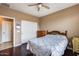 Bedroom with a double bed, dresser, and access to a bathroom at 17957 W Fairview St, Goodyear, AZ 85338