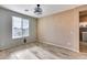 Bright dining room features tile floors and access to backyard at 17957 W Fairview St, Goodyear, AZ 85338