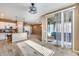 Open concept kitchen with island and view to dining area at 17957 W Fairview St, Goodyear, AZ 85338