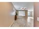 Bright living room with tile floors and neutral walls at 17957 W Fairview St, Goodyear, AZ 85338