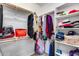 Large walk-in closet with ample shelving and hanging space at 17957 W Fairview St, Goodyear, AZ 85338
