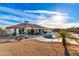 Spacious backyard oasis with a pool and patio at 18235 N 129Th Dr, Sun City West, AZ 85375