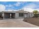 House exterior showcasing a carport and neat front yard at 1825 W Roma Ave, Phoenix, AZ 85015