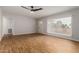 Living room with hardwood floors and large window at 1825 W Roma Ave, Phoenix, AZ 85015