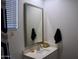 Bathroom with vanity, large mirror and modern fixtures at 21231 E Domingo Rd, Queen Creek, AZ 85142