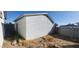 White detached garage with a yard at 3329 W Port Au Prince Ln, Phoenix, AZ 85053