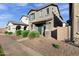 Two-story house with green door and landscaping at 3718 S 58Th Dr, Phoenix, AZ 85043