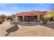 Fountain and large backyard with desert landscaping at 44821 N 12Th St, New River, AZ 85087