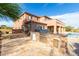 Outdoor kitchen with built-in grill and refrigerator at 10855 E Elba Way, Scottsdale, AZ 85262