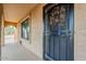 Condo entryway with security door and access to a patio or walkway at 12635 N La Montana Dr # 8, Fountain Hills, AZ 85268