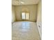 Bedroom with tiled floor and arched window with shutters at 25620 S Cloverland Dr, Sun Lakes, AZ 85248