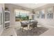 Casual dining area with natural light and built-in shelving at 26493 W Piute Ave, Buckeye, AZ 85396