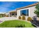 House exterior with landscaping and covered patio at 26493 W Piute Ave, Buckeye, AZ 85396