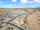 Aerial view showing home's location in a new development with desert landscape at 2860 N Riverdale Ln, Casa Grande, AZ 85122
