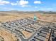 Wide aerial view showing home's location in a residential community at 2860 N Riverdale Ln, Casa Grande, AZ 85122