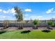 Landscaped backyard with trees and rock borders at 2860 N Riverdale Ln, Casa Grande, AZ 85122