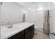 Clean bathroom with single vanity, bathtub, and shower at 2860 N Riverdale Ln, Casa Grande, AZ 85122