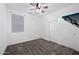 Charming bedroom with ceiling fan and sliding door to closet at 2860 N Riverdale Ln, Casa Grande, AZ 85122
