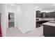 Modern kitchen with dark cabinets and granite countertops at 2860 N Riverdale Ln, Casa Grande, AZ 85122