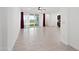 Spacious living room with tile floors and sliding door at 2860 N Riverdale Ln, Casa Grande, AZ 85122