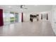 Open living room and kitchen with tile floors at 2860 N Riverdale Ln, Casa Grande, AZ 85122